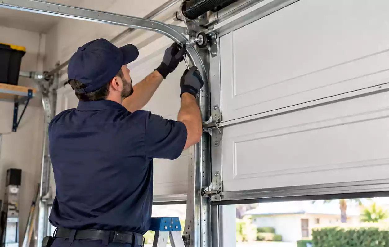 Garage door alignment and maintenance inspection