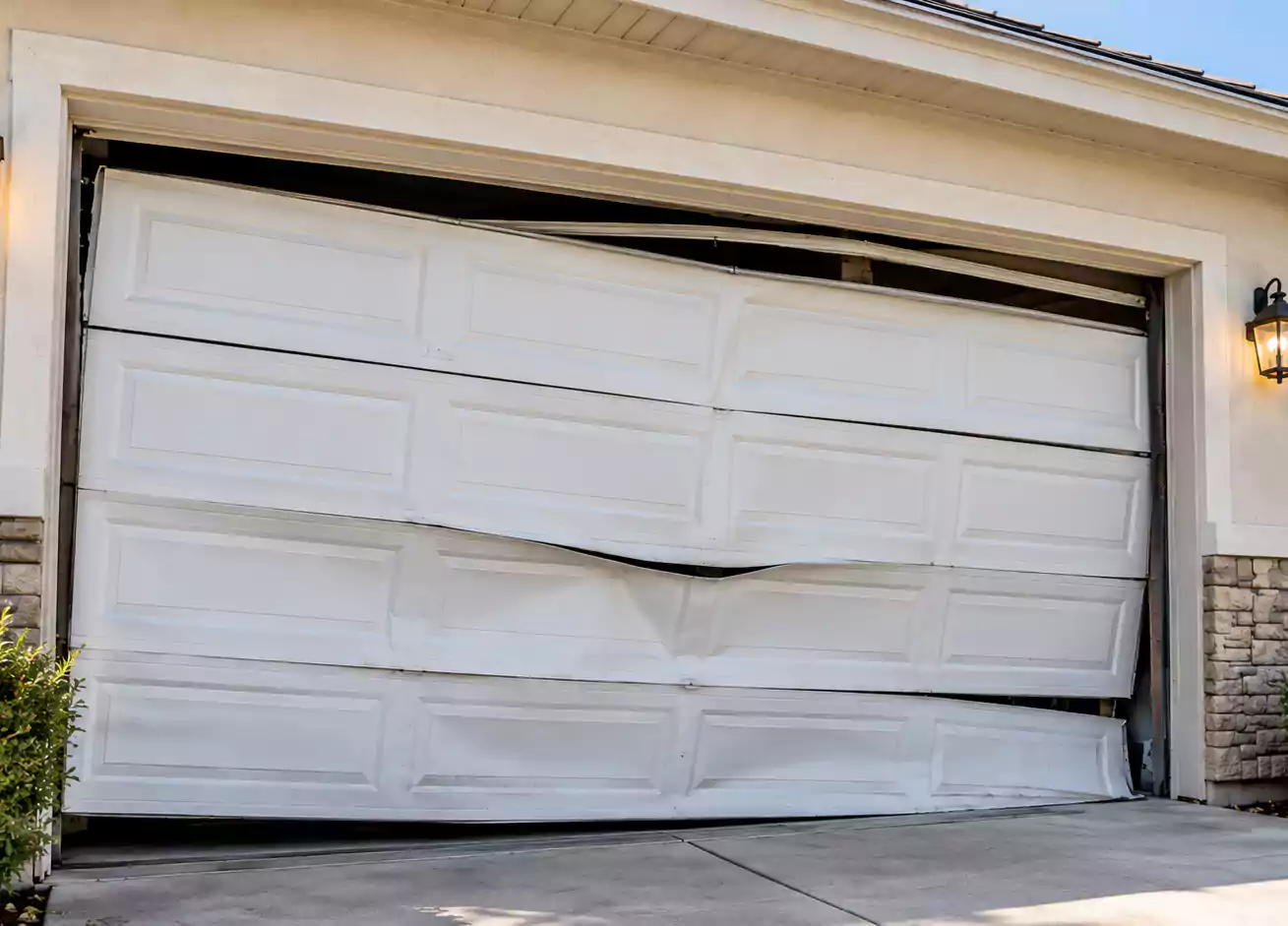 Garage door before repair