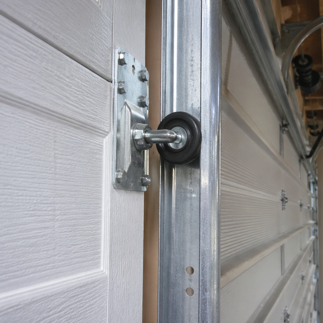 Garage Door Roller Repair CA movement noise and friction inspection