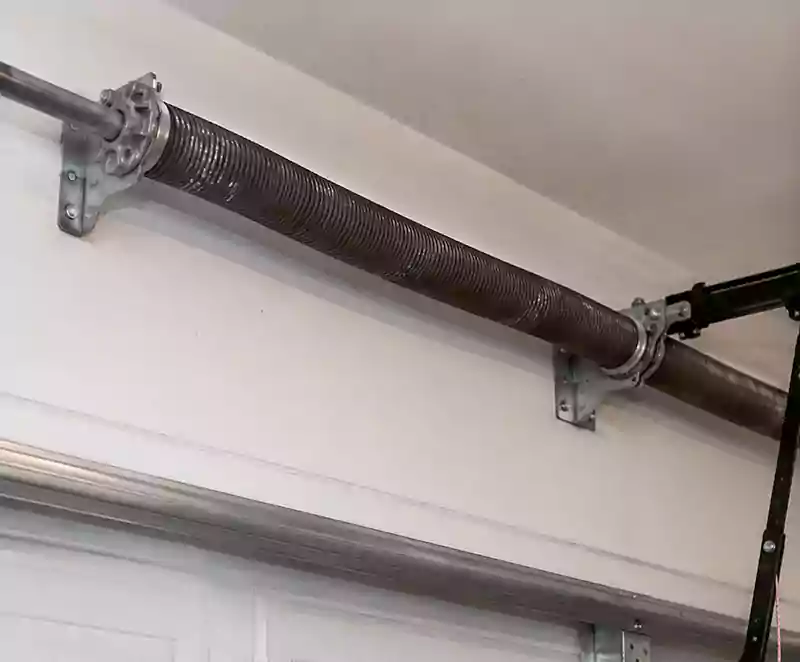 Garage Door Spring Repair CA worn coil and lifting hardware inspection