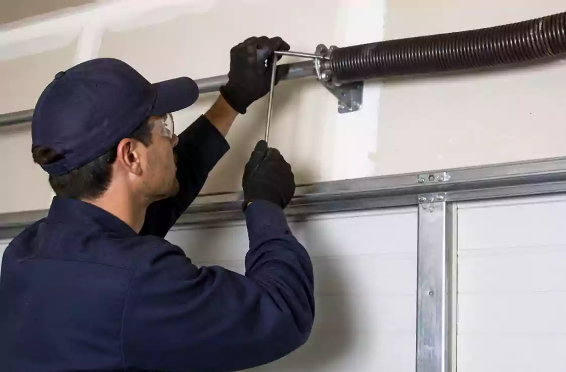 Garage Door Spring Repair CA routine upkeep and developing spring issue inspection